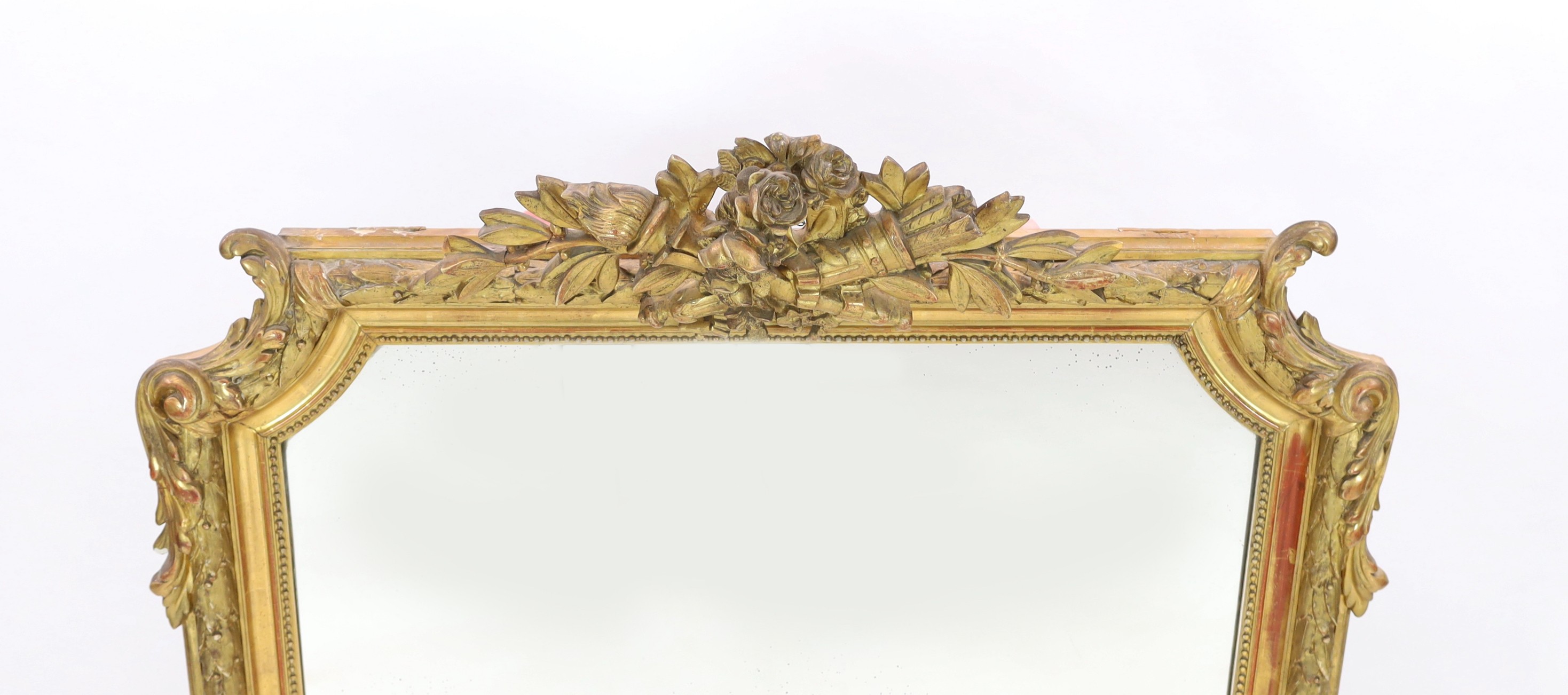 A late 19th century French giltwood and gesso overmantel mirror, width 105cm, height 149cm